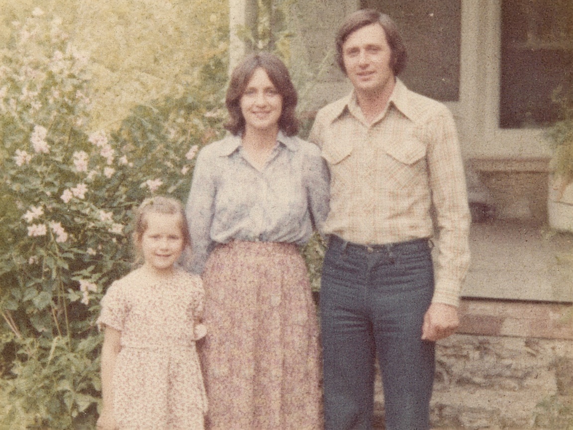 Faded 1970s family snapshot with yellowed paper