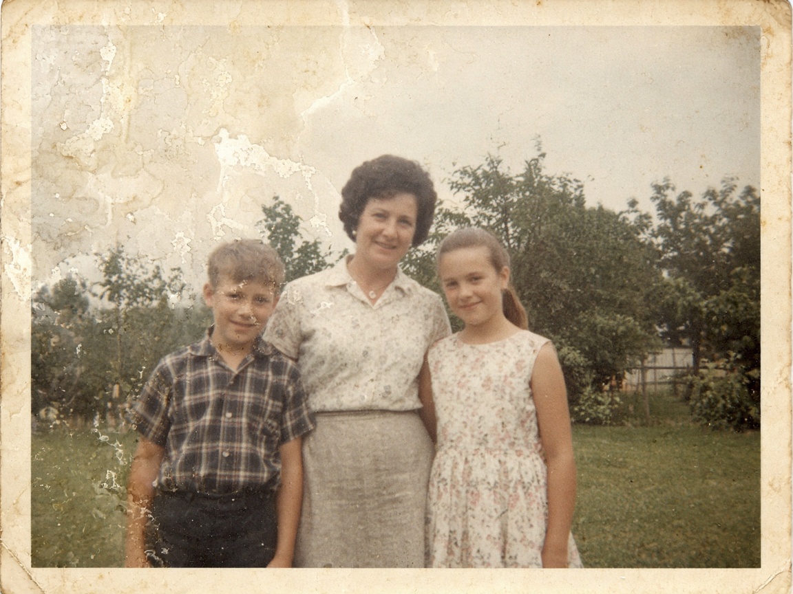 Family snapshot with water marks and brown spots